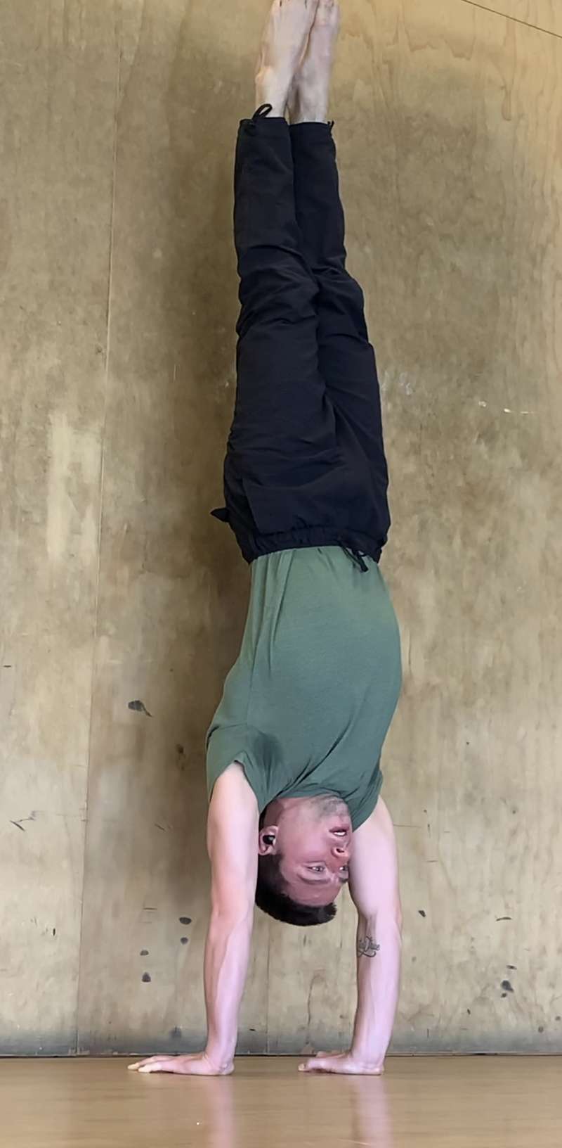 Hand balancing progression — wall-supported handstand